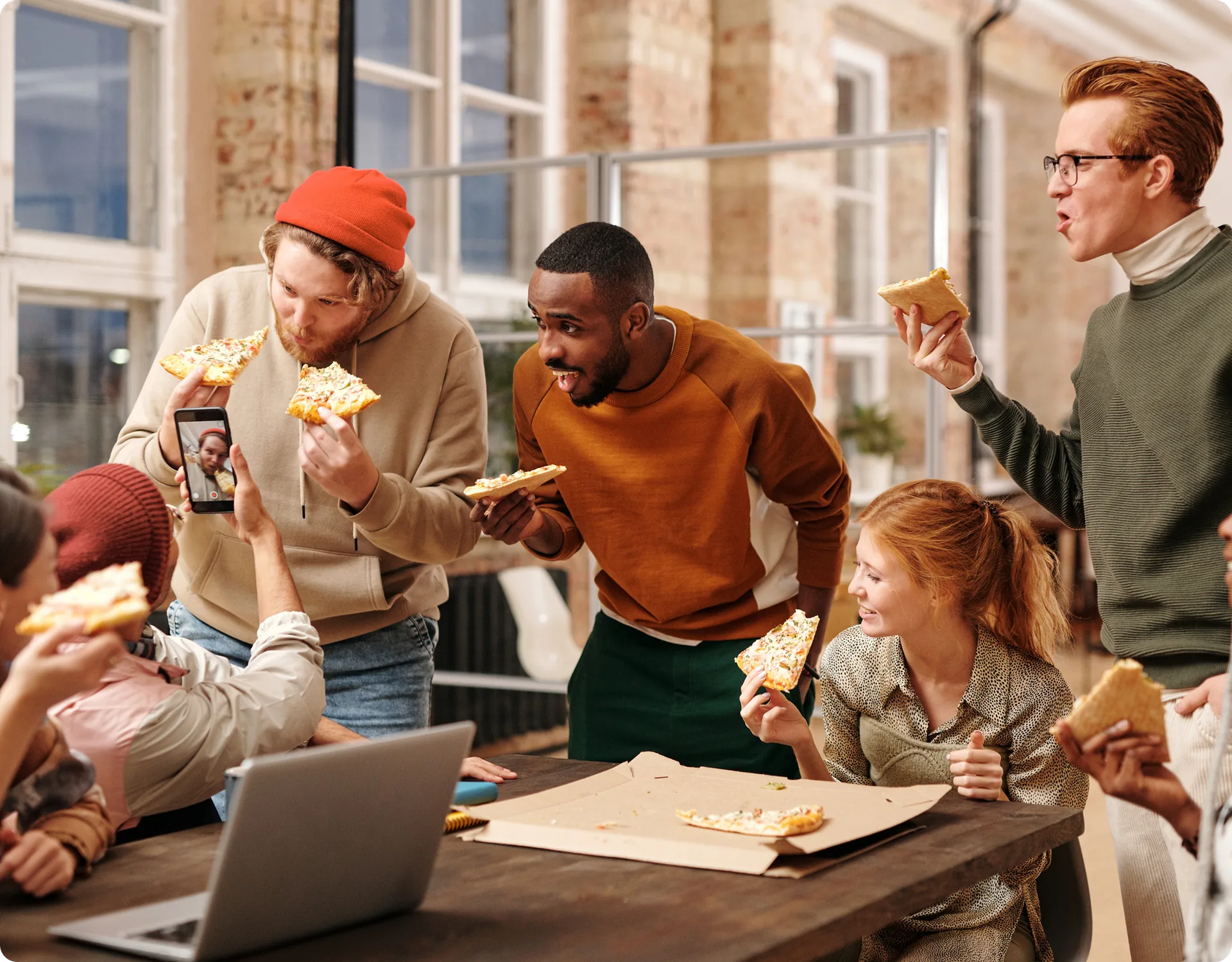 Neighbours sharing a meal at a building meetup