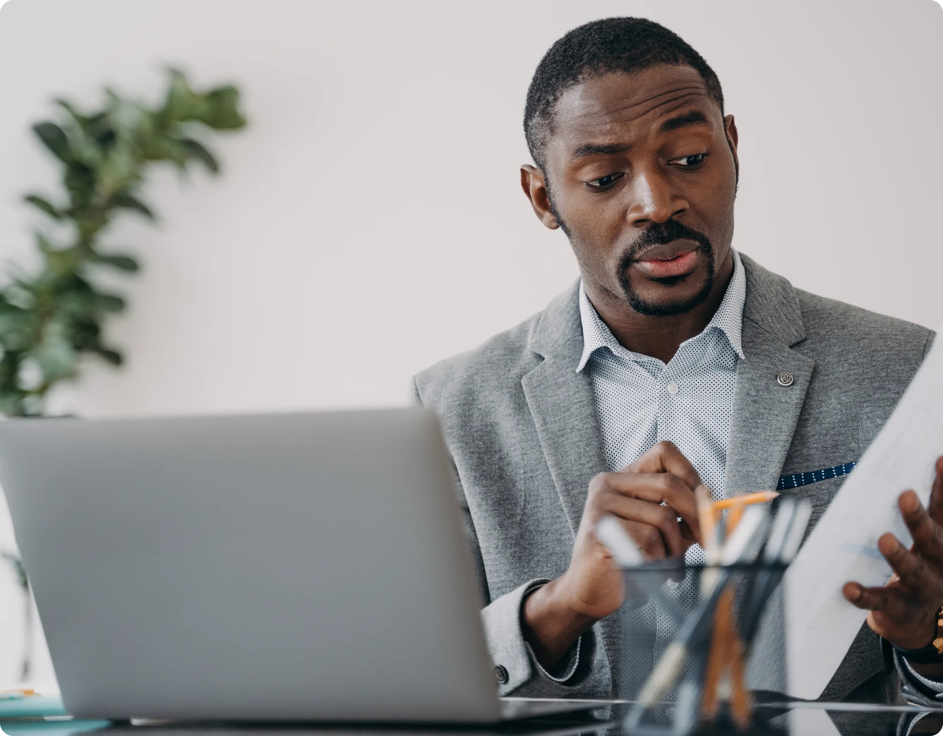 A moderator reviewing community activity on a laptop