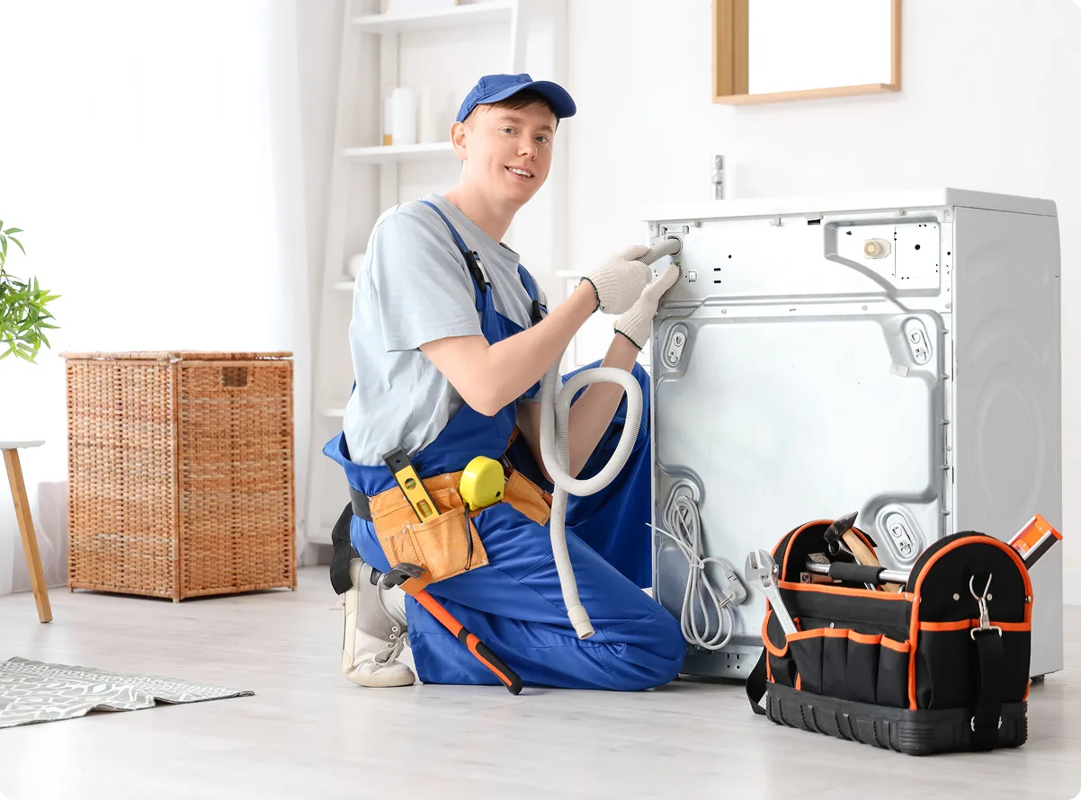 A maintenance contractor servicing an appliance