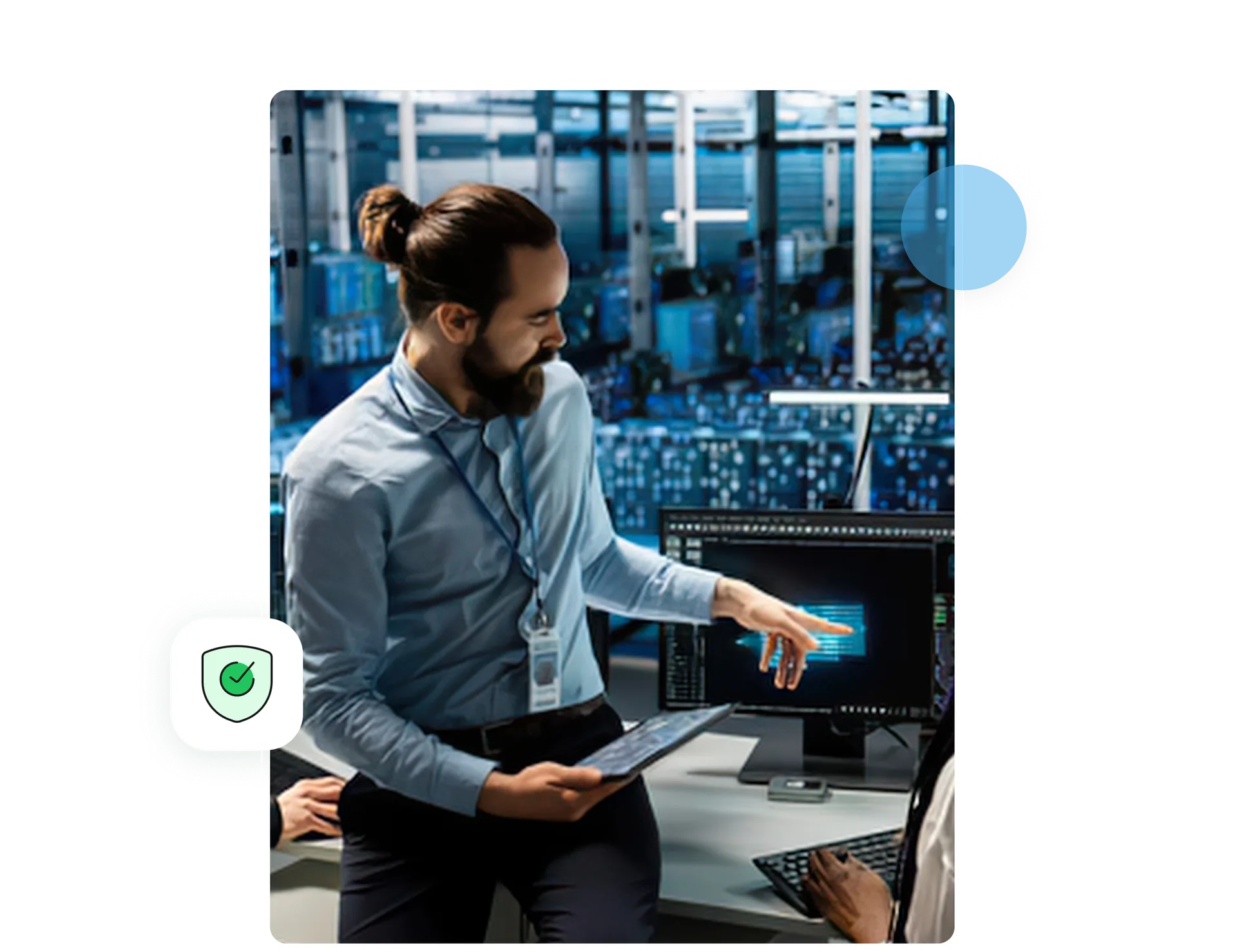 A security engineer reviewing monitoring dashboards in a data centre