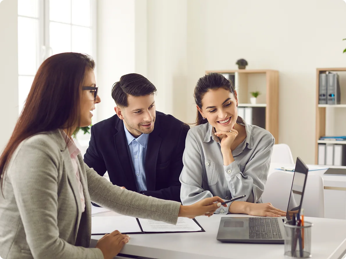 A property management team working together at a desk