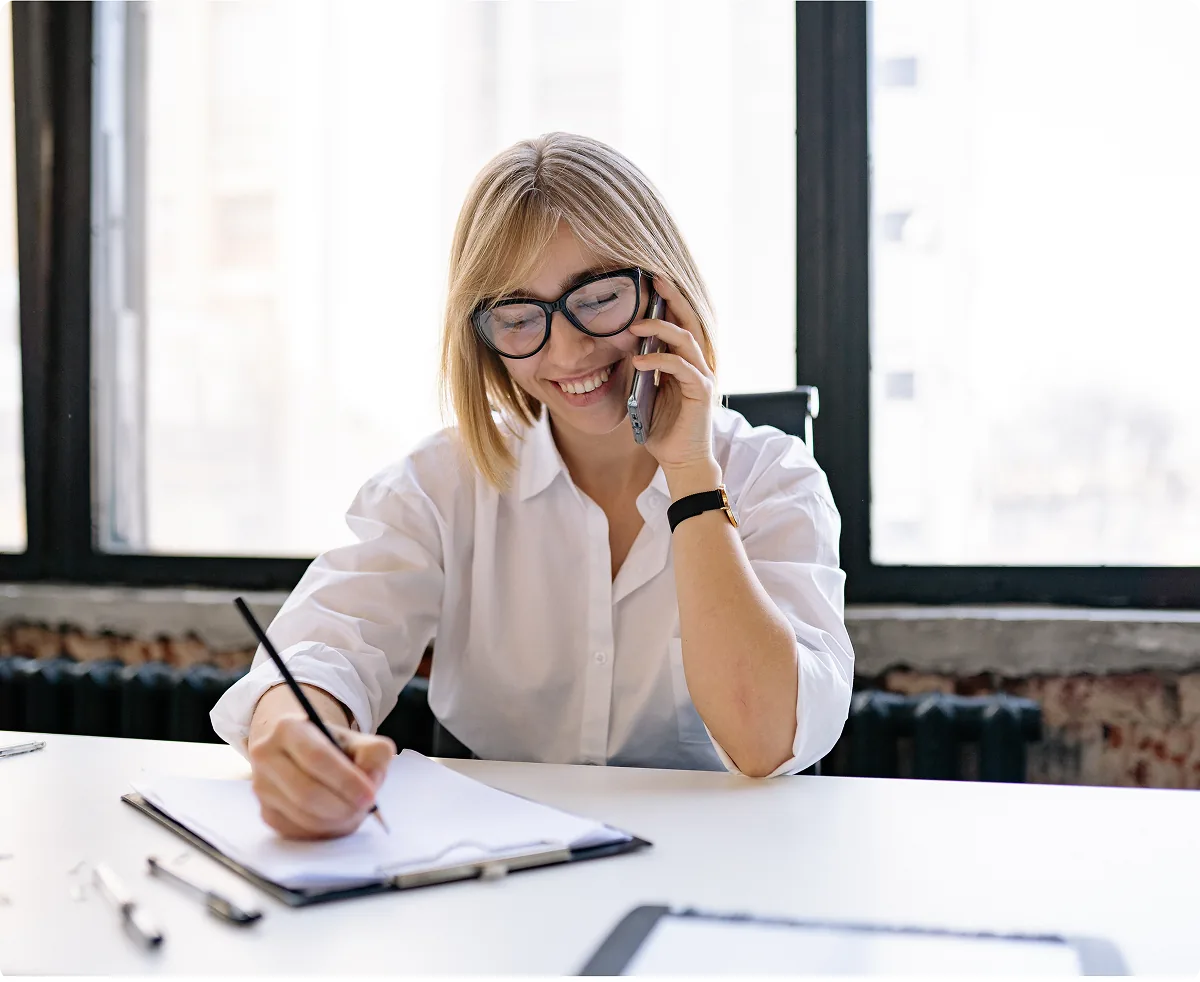 A member of the team following up with an applicant by phone
