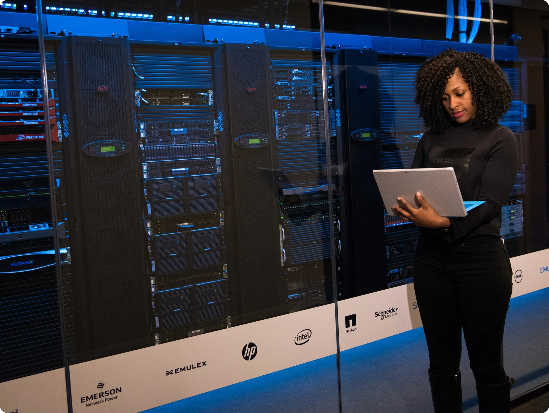 An engineer checking equipment in a secure data centre