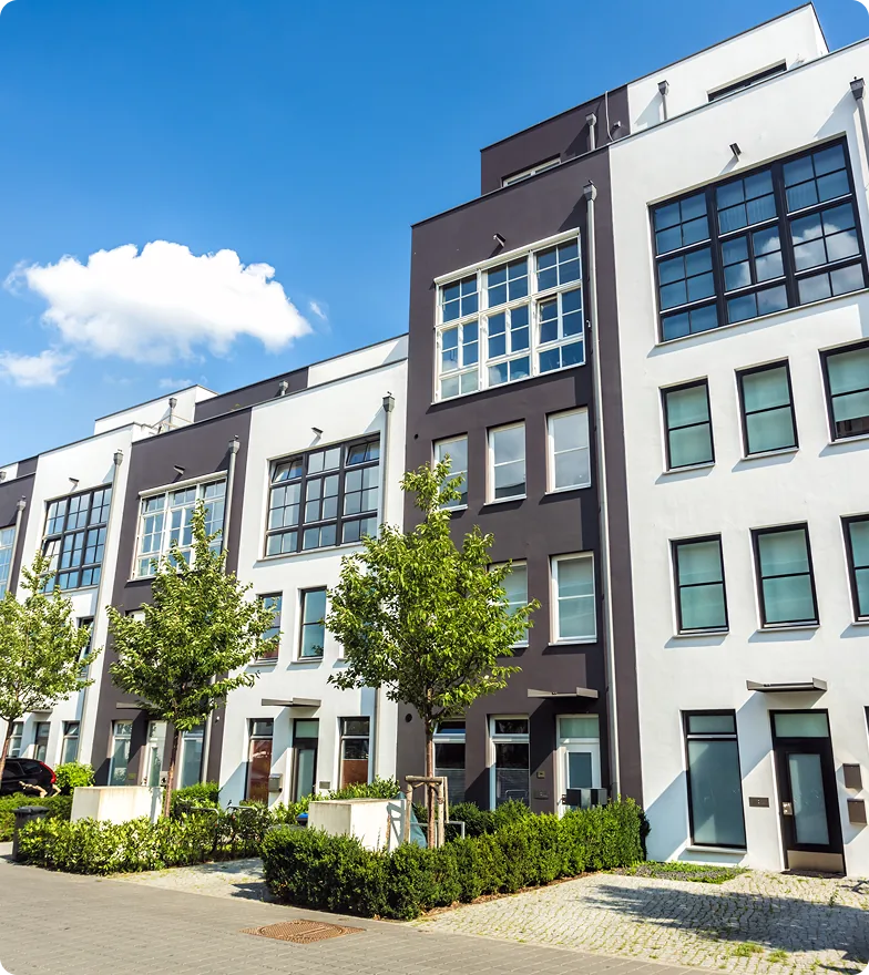 A modern mixed-use building on a sunny day